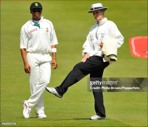 Umpire Billy Bowden signals a leg bye as South Africa's Makhaya Ntini looks on during the 2nd Test match between England and South Africa at...