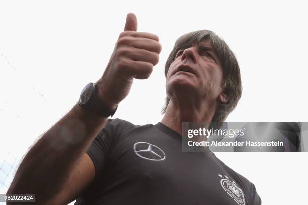 Joachim Loew, head coach of Germany talks to the media after a press conference after a training session of the German national team at Sportanlage...