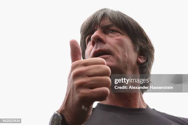 Joachim Loew, head coach of Germany talks to the media after a press conference after a training session of the German national team at Sportanlage...