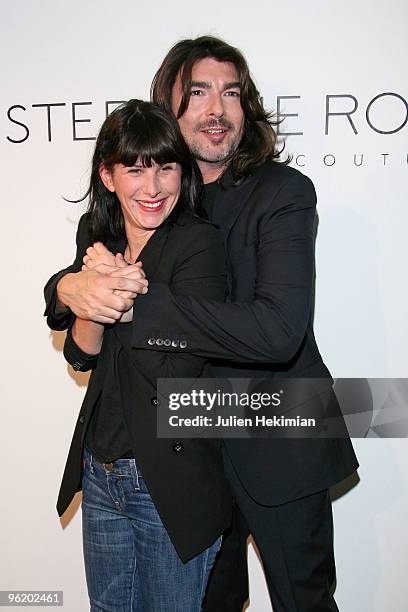 Cecile Togni and Stephane Rolland pose as they attend the Stephane Rolland Haute Couture show as part of the Paris Fashion Week S/S 2010 at Cite de...