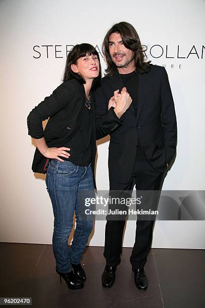 Cecile Togni and Stephane Rolland pose as they attend the Stephane Rolland Haute Couture show as part of the Paris Fashion Week S/S 2010 at Cite de...