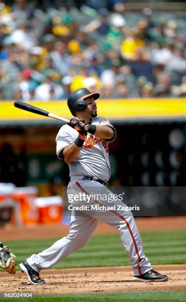 Pedro Alvarez of the Baltimore Orioles hits a home run during the game against the Oakland Athletics at the Oakland Alameda Coliseum on May 6, 2018...