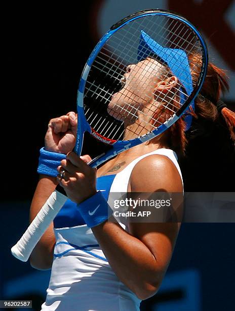 Li Na of China celebrates her victory over Venus Williams of the US in their women's singles quarter-final match on day 10 of the Australian Open...