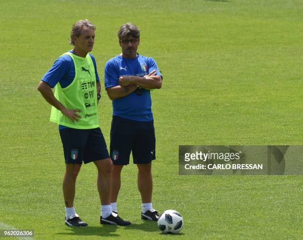 Italy's national football team new coach Roberto Mancini and assistant coach Alberico Evani take part in a training session on May 24, 2018 at...