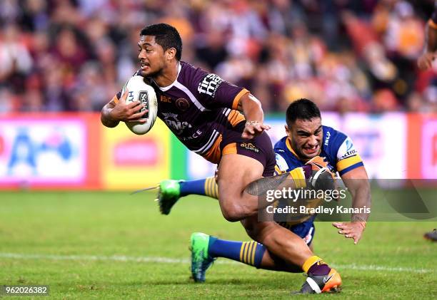 Anthony Milford of the Broncos breaks away from the defence during the round 12 NRL match between the Brisbane Broncos and the Parramatta Eels at...