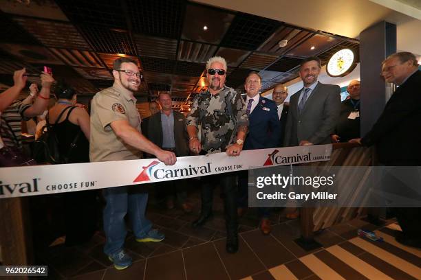 Guy Fieri opens the Pig & Anchor restaraunt as part of the naming celebration for the Carnival cruise ship Horizon at Pier 88 on May 23, 2018 in New...