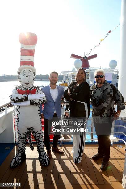 Jake Elliott, Cat In The Hat, Queen Latifah and Guy Fieri pose on deck during the naming celebration for the Carnival cruise ship Horizon at Pier 88...