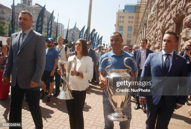 Kyiv City Mayor Vitalii Klitschko , UEFA's Ambassador of Women Champions League final Iya Andrushchak and former soccer player of Milan Cafu , carry...