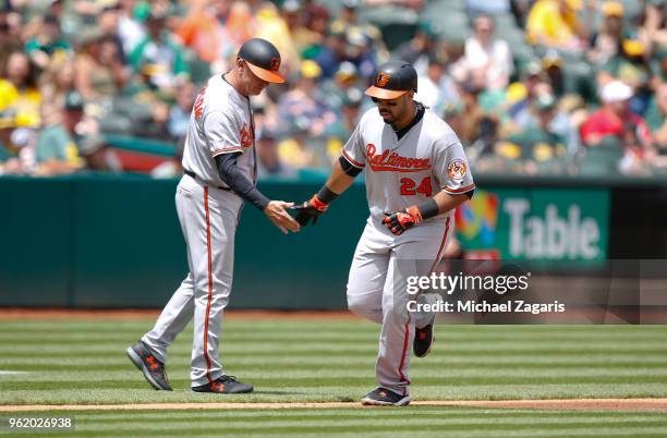 Pedro Alvarez of the Baltimore Orioles runs the bases after hitting a home run during the game against the Oakland Athletics at the Oakland Alameda...