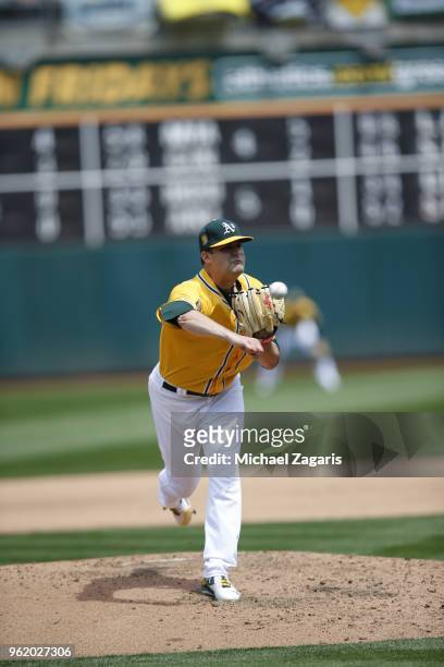 Andrew Triggs of the Oakland Athletics pitches during the game against the Baltimore Orioles at the Oakland Alameda Coliseum on May 6, 2018 in...