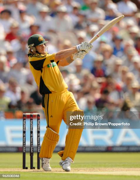 Shane Watson of Australia hits a boundary off the bowling of England's James Anderson during the 3rd NatWest Series One Day International between...