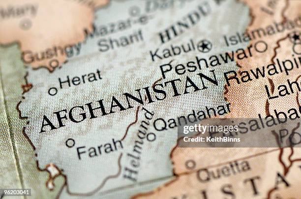 a map with a close-up focus on afghanistan - terrorism news stock pictures, royalty-free photos & images