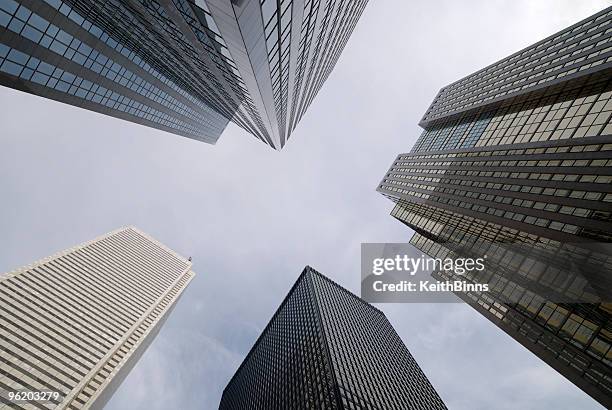 view from the ground looking up at skyscrapers - toronto buildings stock pictures, royalty-free photos & images