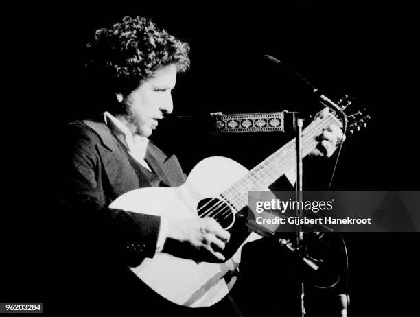 Bob Dylan performs live on stage with The Band at Madison Square Garden, New York as part of his 1974 Tour Of America on January 30 1974