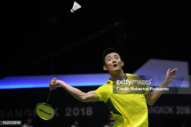 Chen Long of China competes against Chou Tien Chen of Chinese Taipei during the Quarter-finals match on day five of the BWF Thomas & Uber Cup at...