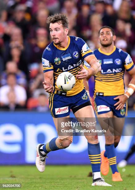 Clint Gutherson of the Eels passes the ball during the round 12 NRL match between the Brisbane Broncos and the Parramatta Eels at Suncorp Stadium on...