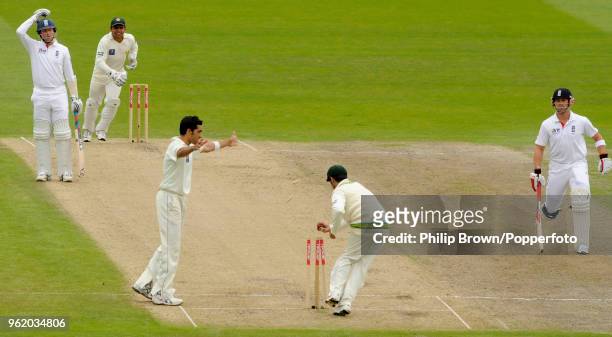 England batsman Matt Prior is run out by Pakistan's Salman Butt as Graeme Swann of England reacts during the 1st Test match between England and...