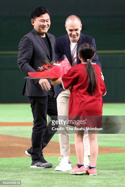 Vissel Kobe new signing Andres Iniesta receives a flower bouquet prior to the professional baseball game between Rakuten Golden Eagles and Orix...