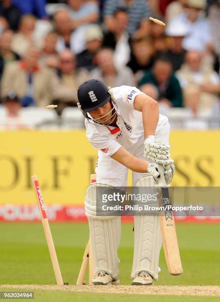 Jonathan Trott of England is bowled for 26 runs by Pakistan's Umar Gul during the 1st Test match between England and Pakistan at Trent Bridge,...