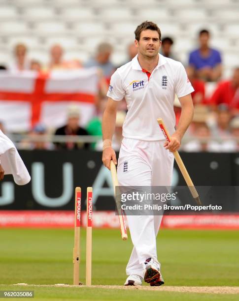 James Anderson of England leaves the field with two souvenir stumps after England defeated Pakistan by 354 runs in the 1st Test match between England...