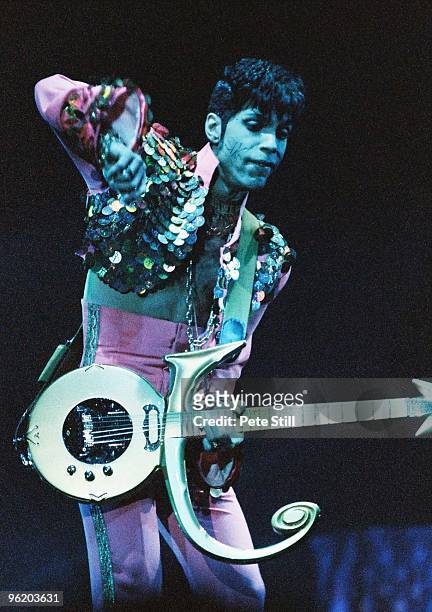 Prince performs on stage wearing 'Slave' tattoo, on 'The Ultimate Live Experience' tour at Wembley Arena on March 4th, 1995 in London, United Kingdom.