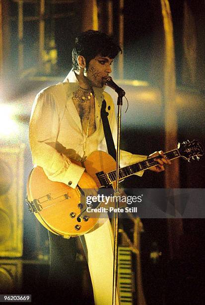 Prince performs on stage on 'The Ultimate Live Experience' tour at Wembley Arena on March 4th, 1995 in London, United Kingdom. He plays an Epiphone...