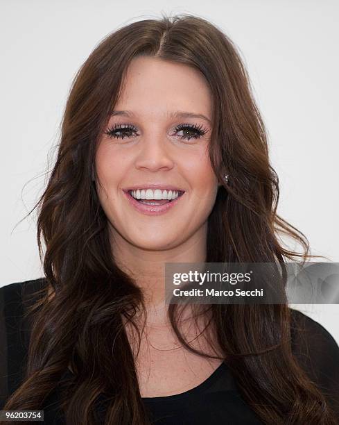 Model Danielle Lloyd poses with a cheque to be presented to Judy Morgan from "Guiding Light/The Lantern Project', on January 27, 2010 in London,...