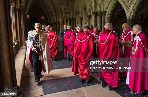 Knights of the Order of the Bath gather in the cloisters of Westminster Abbey, London on May 24 during the Order of the Bath service.