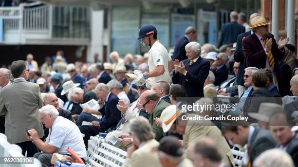 Alastair Cook of England walks out to bat after lunch at the NatWest 1st Test match between England and Pakistan at Lord's Cricket Ground on May 24,...