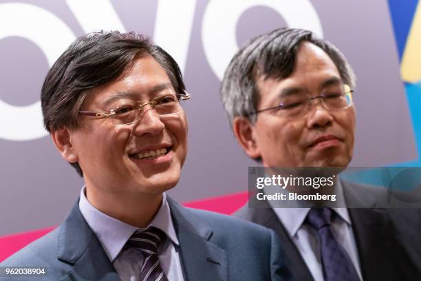 Yang Yuanqing, chairman and chief executive officer of Lenovo Group Ltd., left, and Wong Wai Ming, executive vice president and chief financial...