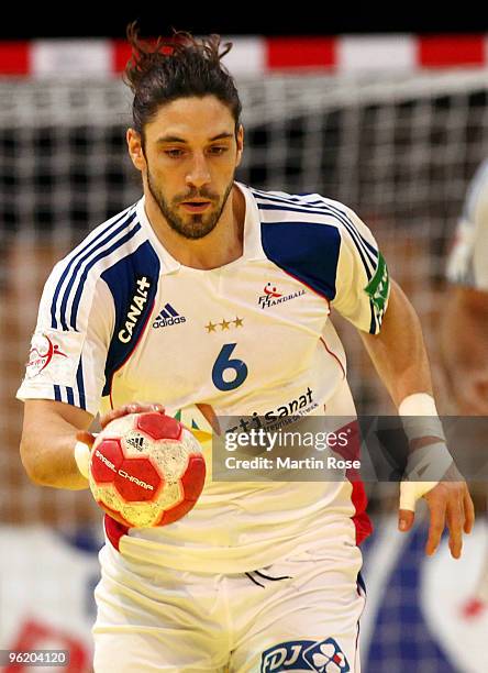 Betrand Gille of France plays the ball during the Men's Handball European main round Group II match between Slovenia and France at the Olympia Hall...