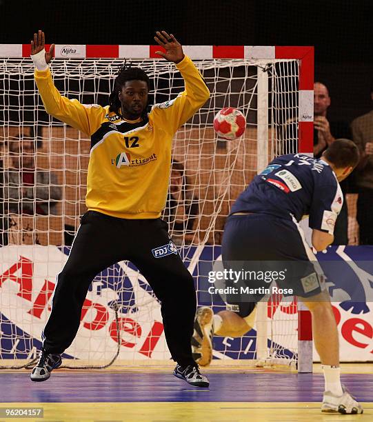 Daouda Karaboue, goalkeeper of France saves the ball during the Men's Handball European main round Group II match between Slovenia and France at the...