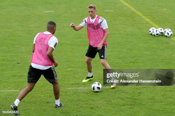 Nils Petersen and Jonathan Tah play with the ball during a training session of the German national team at Sportanlage Rungg on day two of the...