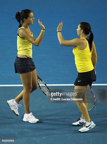 Laura Robson of Great Britain and Sally Peers of Australia celebrates a point in their quarterfinals doubles match against Maria Kirilenko of Russia...
