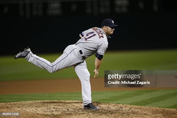 Brad Peacock of the Houston Astros pitches during the game against the Oakland Athletics at the Oakland Alameda Coliseum on May 8, 2018 in Oakland,...