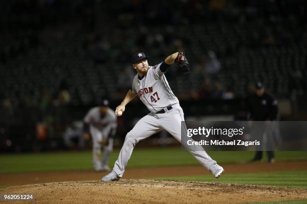Chris Devenski of the Houston Astros pitches during the game against the Oakland Athletics at the Oakland Alameda Coliseum on May 8, 2018 in Oakland,...
