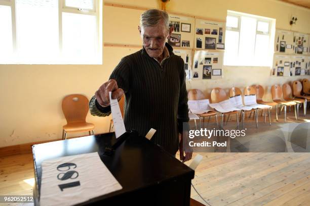 Island resident John McGinley casts his vote for the referendum on liberalising abortion law a day early for the few people that live off the coast...