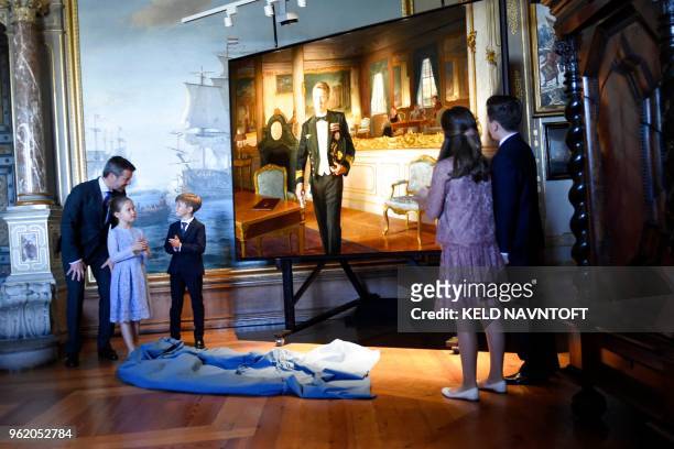 Crown Prince Frederik of Denmark attends the official unveiling of a portrait of him by Australian artist Ralph Heimans on May 24, 2018 at...