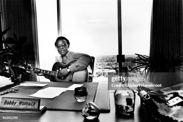 Bobby Womack performs in his Los Angeles office in 1974