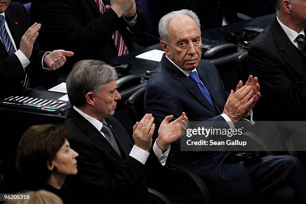 Israeli President Shimon Peres sits next to German President Horst Koehler after Peres spoke to the German parliament, the Bundestag, at the...