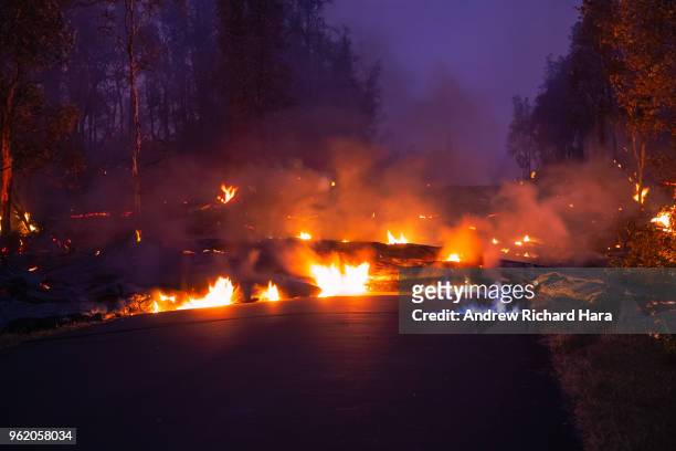 Lava flows from a Fissure in the aftermath of eruptions from the Kilauea volcano on Hawaii's Big Island, on May 22, 2018 in Pahoa, Hawaii. The U.S....