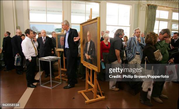 Art expert Rupert Maas stands near a picture of Sir Donald Bradman during a recording of Antiques Roadshow in the Long Room at Lord's Cricket Ground,...