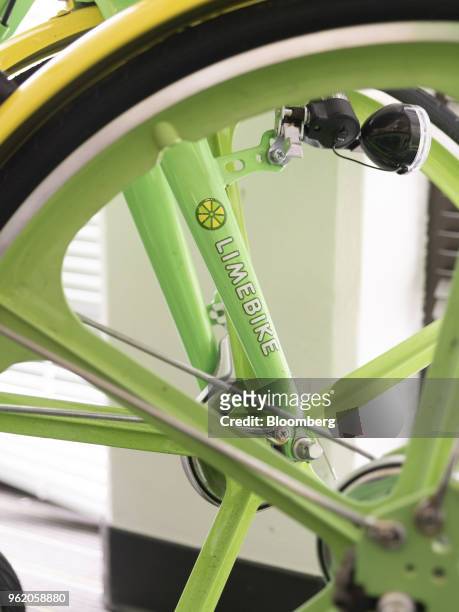 Previous generation bicycle stands inside LimeBike headquarters in San Mateo, California, U.S., on Tuesday, May 22, 2018. Neutron Holdings Inc....