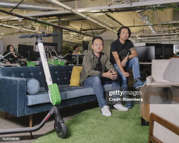 Toby Sun, co-founder and chief executive officer of LimeBike, left, and Brad Bao, co-founder of LimeBike, sit for a photograph at the company's...