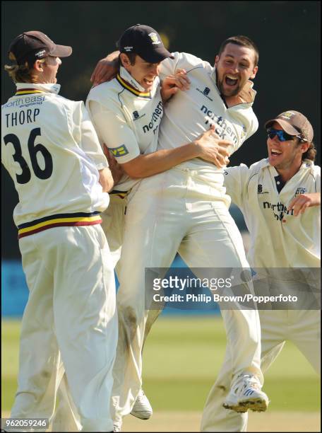 Steve Harmison of Durham celebrates with brother Ben Harmison after taking the final wicket to win the LV County Championship match between Kent and...