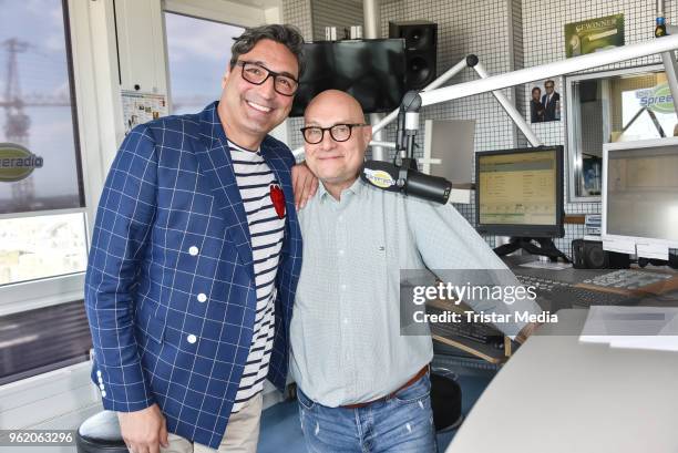 Mousse T. Visits the Spree Radio with presenter Thomas Koschwitz on May 24, 2018 in Berlin, Germany.