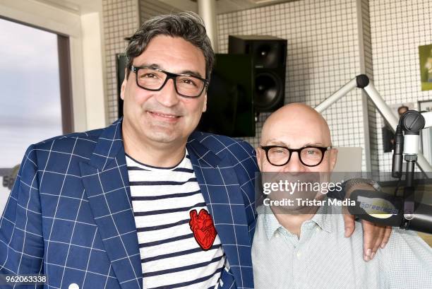 Mousse T. Visits the Spree Radio with presenter Thomas Koschwitz on May 24, 2018 in Berlin, Germany.