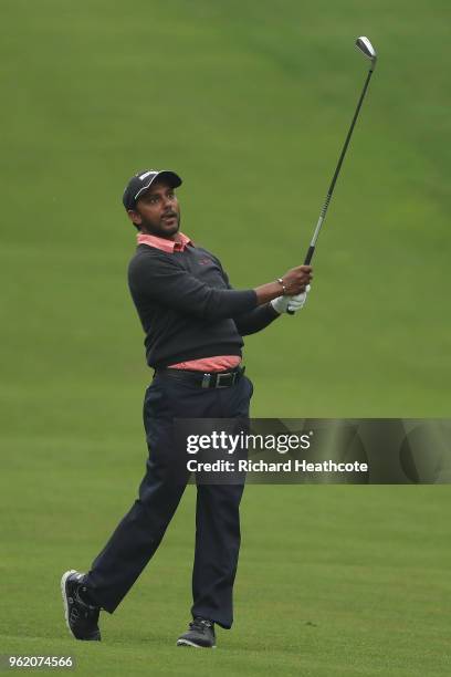 Chawrasia of India hits his second shot on the 4th hole during the first round of the BMW PGA Championship at Wentworth on May 24, 2018 in Virginia...