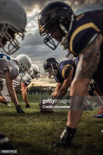 american football players on a beginning of the match. - yankee game stock pictures, royalty-free photos & images