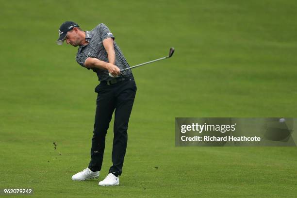 Alexander Bjork of Sweden hits his second shot on the 4th hole during the first round of the BMW PGA Championship at Wentworth on May 24, 2018 in...